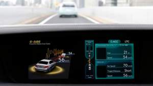 A display on a Toyota test car shows the Cooperative-adaptive Cruise Control in Tokyo